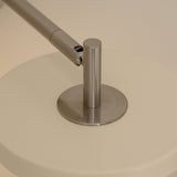 UMAGE_lifestyle_Asteria_wall lamp_short_hardwired_pearl white_steel_(3).jpeg