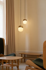 UMAGE_lifestyle_Spring_pendant lampshade_medium_mini_brass_(2).jpeg
